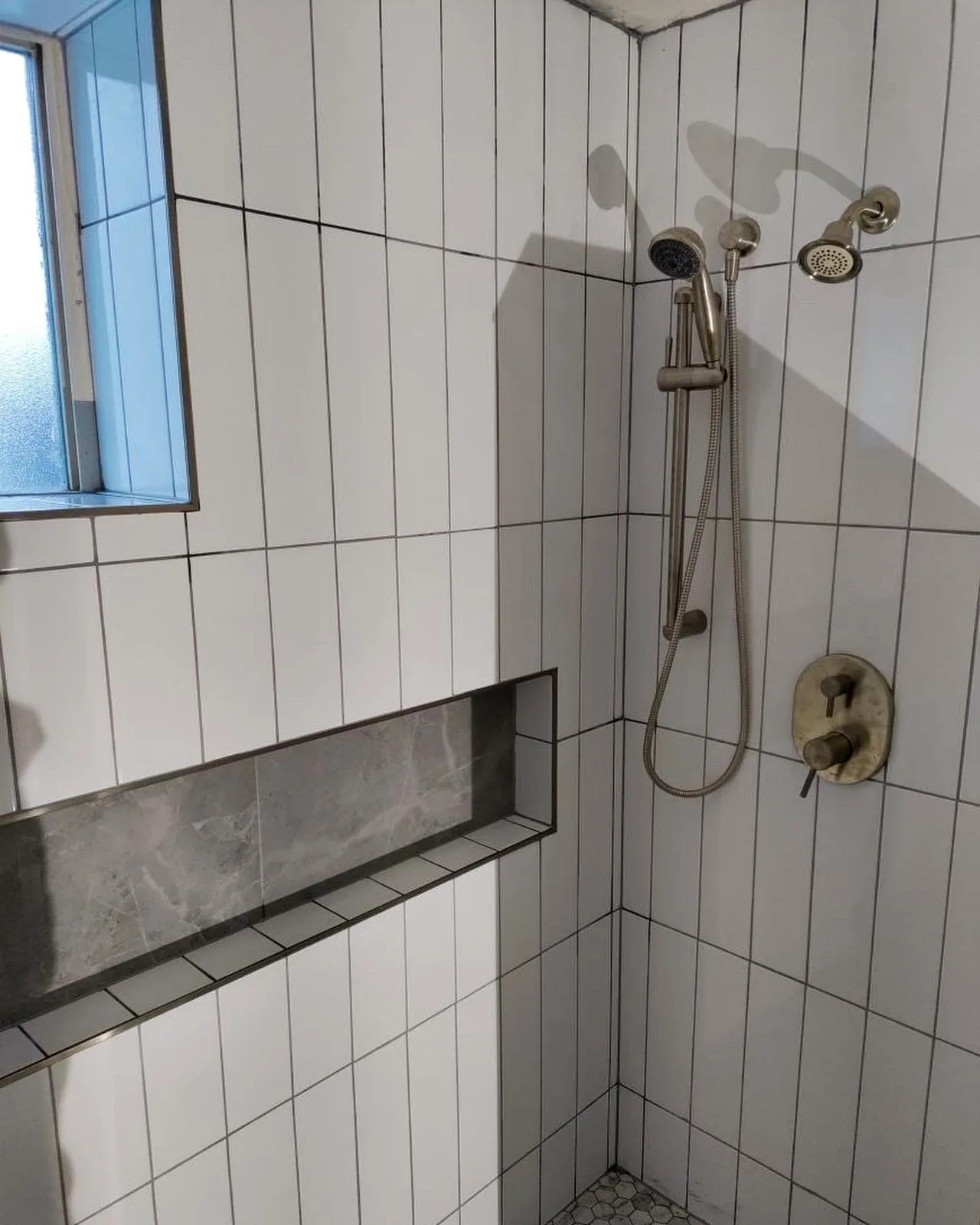 White tile shower installation by T&S Floors in Utah County