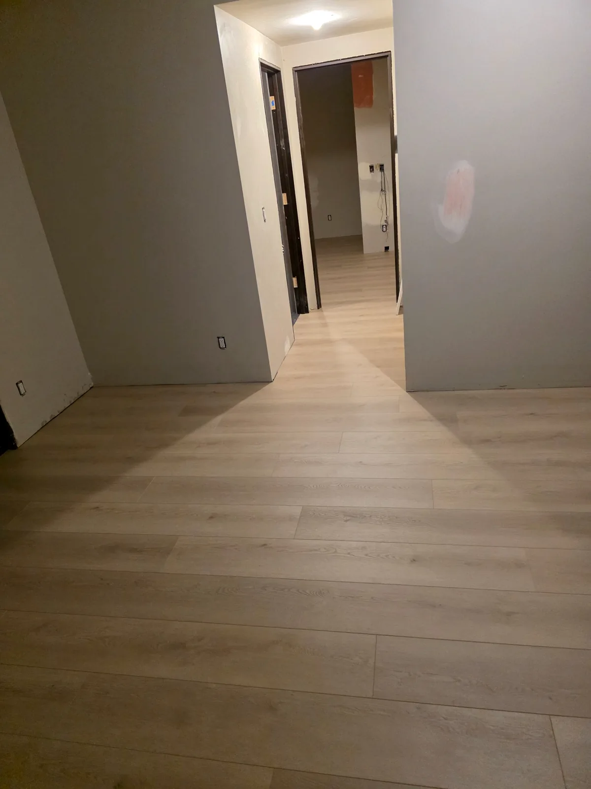 Finished hallway flooring by T&S Floors in Utah County